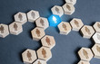 © Andrii Yalanskyi - Blue human figurine connects employees into a large company network connection system. Leader and leadership. Teamwork cooperation, collaboration. Link of the whole. Important unit, responsible post.