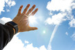 © studiosacco - Blocking the bright sun with your hand