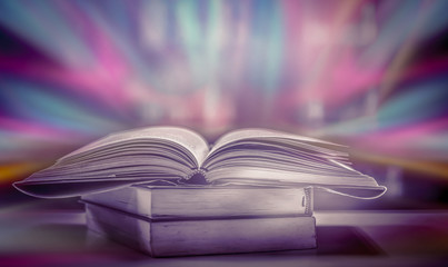Poster - imagine opening an old book blurred with magic power on the table and the english alphabet floating 