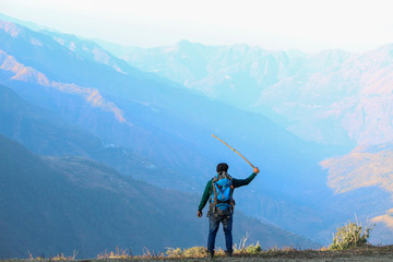 Hiker on the top of mountain