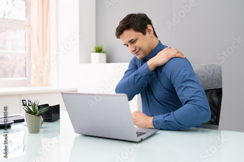 Cuadros en Lienzo Mature Businessman Suffering From Shoulder Pain