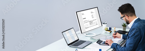 Fotomural Accountant Making Invoice On Computer