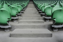 Empty Plastic Seats In A Stadium. Matches To Be Played Without Fans.
