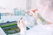 © chibelek - Microsurgical instruments and doctor hands. Doctor in operating room holding special ophthalmic surgeon tools.