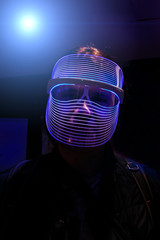 Portrait of the man in futuristic mask in cyberpunk style