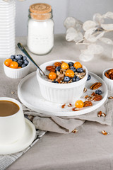 family breakfast. granola with fresh fruits.