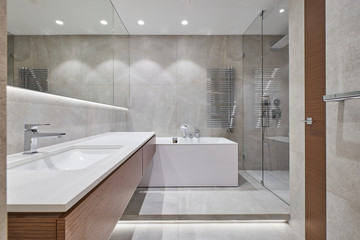 modern bathroom with mirror, bathtub and shower