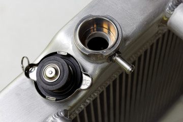 Close up radiator cap with Aluminum Radiator Filler Neck