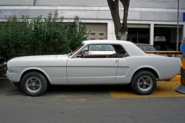 Classic American car in a repair shop