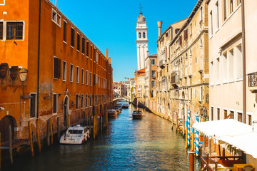 Wall Mural - A nice canal with tourists sailing from Venice. Italy