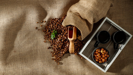 Wall Mural - Fresh coffee on a jute sack in the Brazilian morning with free space for an advertising product