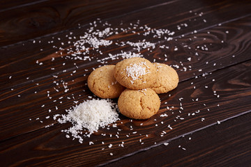 Lean cookies with coconut on a brown background