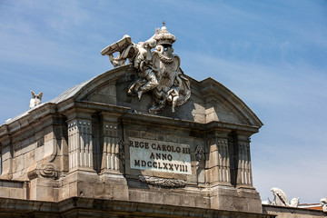 Wall Mural - The famous Puerta de Alcala on a beautiful sunny day in Madrid City. Inscription on the pediment: Rey Carlos III year 1778