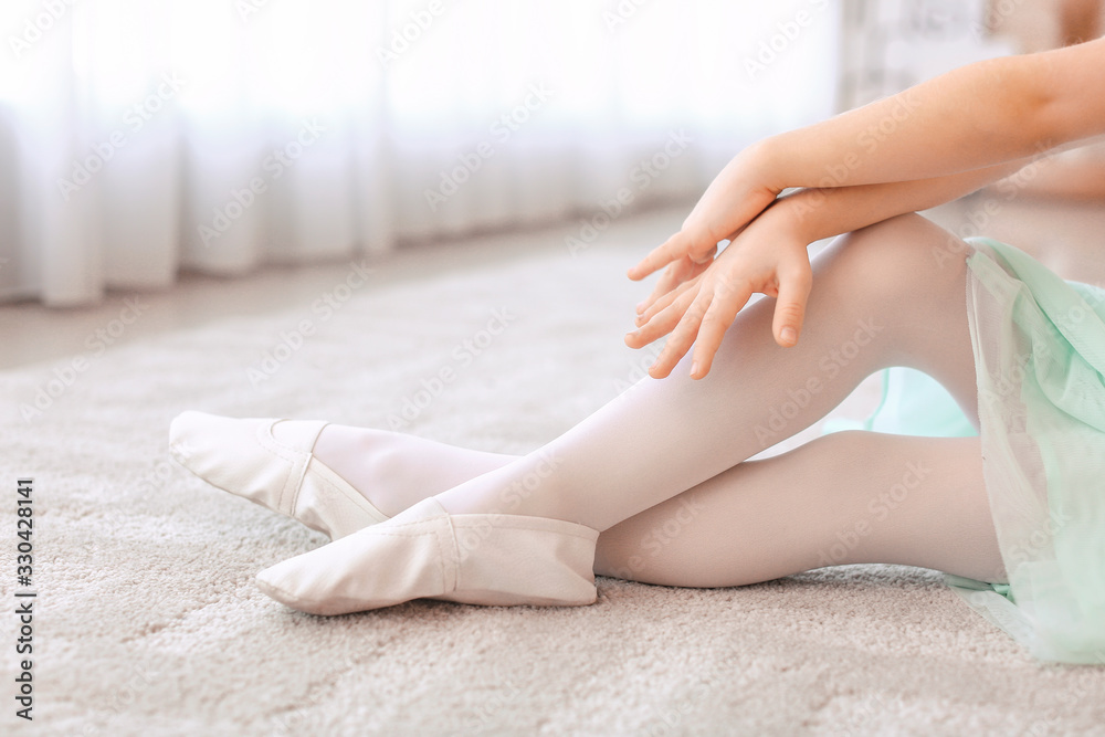Cute little ballerina at home