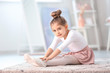 © Pixel-Shot - Cute little ballerina at home