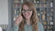 © stockbakers - The Portrait of Cheerful Young Woman Pointing Finger at Camera