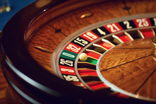 Close Up Roulette Wheel White Ball At Zero In Casino