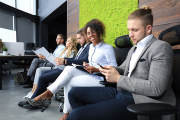 Wall Mural - Modern business people waiting for job interview