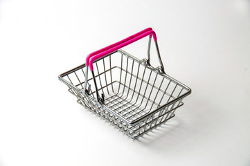 Wall Mural - Shopping basket isolated on a white background. Concept discounts, purchase or sale of goods