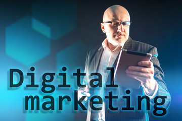 Poster - Digital marketing. Promotion of goods and services using digital technologies. Internet marketing. Advertising products and services in mobile apps. A man watches a commercial on a tablet screen.