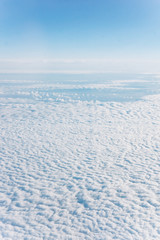 Sticker - Fantastic background with clouds. The view above the clouds.