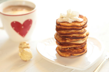 Canvas Print - Homemade pancakes with breackfast coffee cup. Healthy morning breakfast with candies.