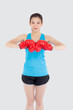 © NT_studio - Beautiful portrait young asian woman wearing red boxing gloves with strength and strength isolated on white background, girl workout exercise is sport training with punch, health concept.