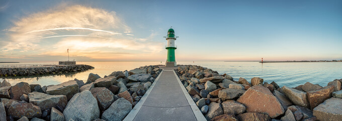 Wall Mural - westmole lighthouse in warnemünde near rostock
