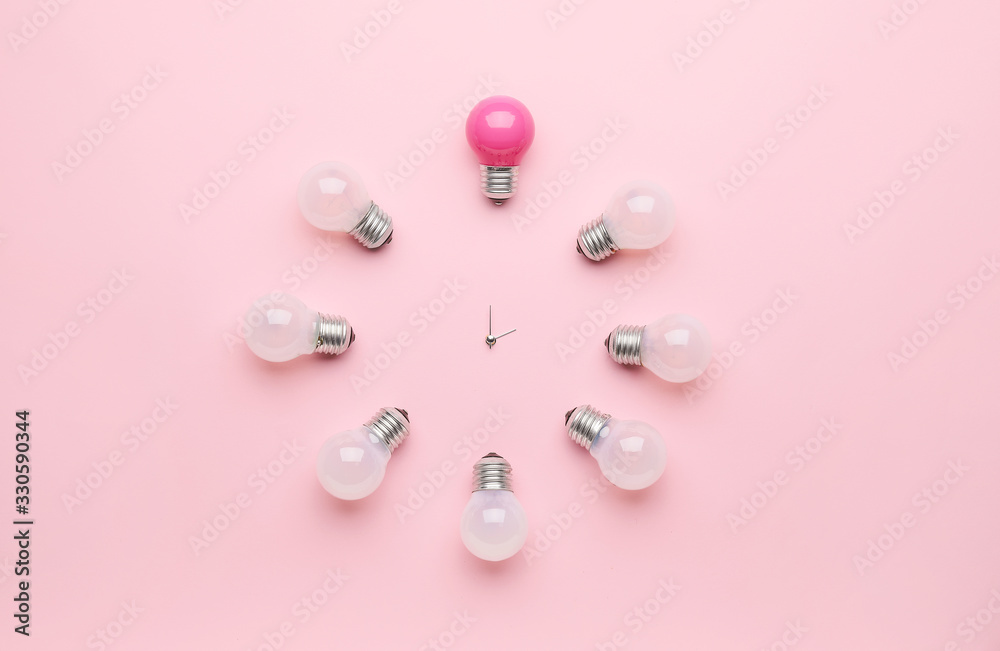 Creative clock made of light bulbs on color background - obrazy, fototapety, plakaty 