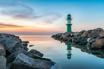Wall Mural - westmole lighthouse in warnemünde near rostock, germany