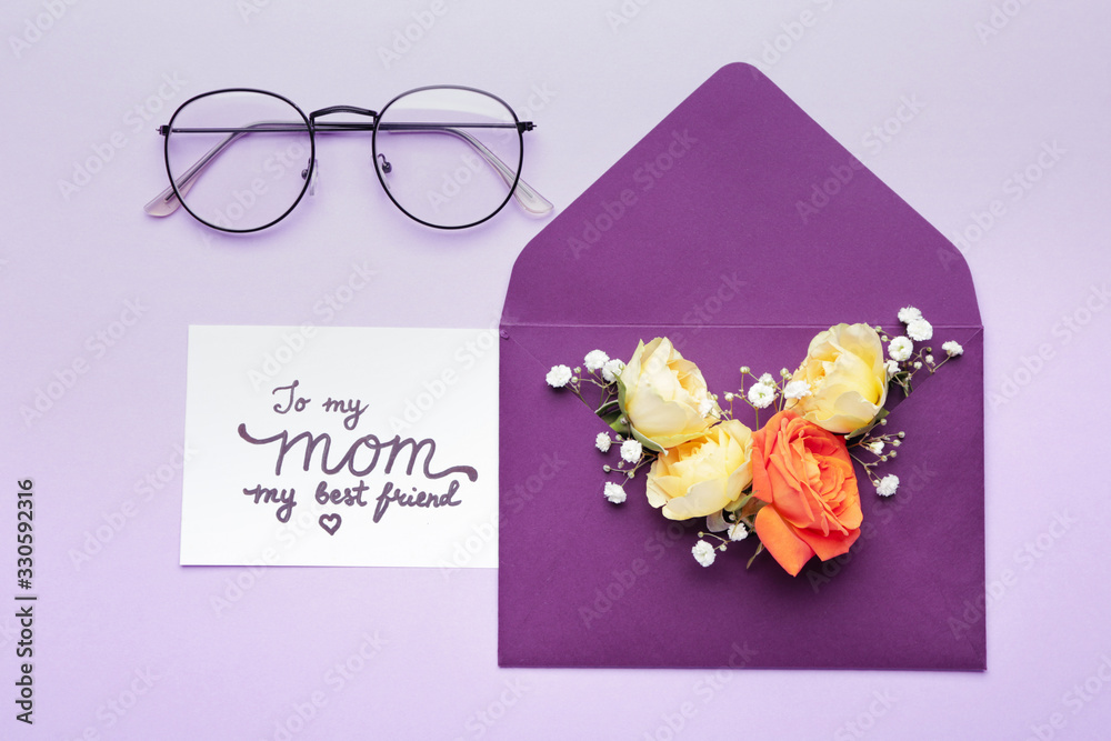 Composition with greeting card for mother on color background