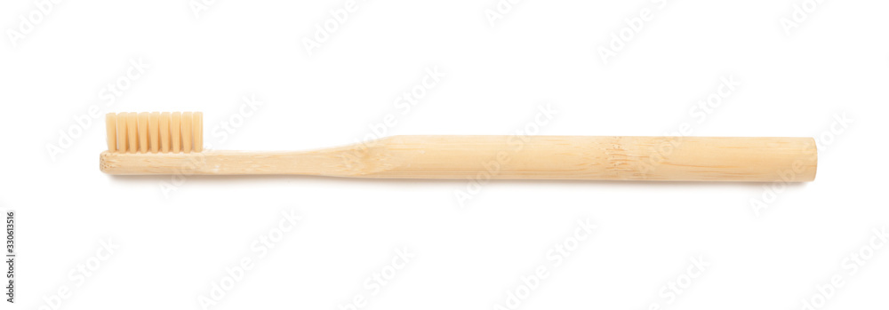 Wooden tooth brush on white background