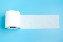 One Toilet Paper Roll Isolated On Blue Background