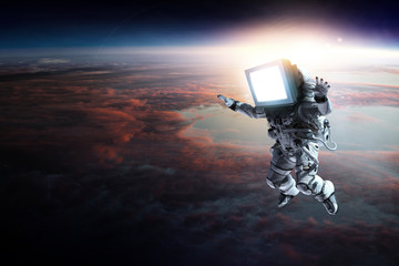 Wall Mural - astronaut with tv head in space. mixed media.