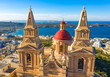 Aerial view close up view of Mellieha Parish Church or Birth of Our Lady. Sea and blue sky. Malta country