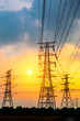 © zhao dongfang - Industrial high voltage electricity tower and beautiful nature landscape at summer sunset