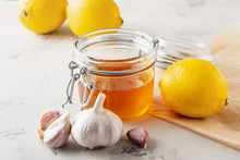 Alternative Medicine, Natural Home Remedy For Cold And Flu. Ginger, Lemon, Garlic And Honey
