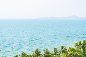 Beautiful tropical nature of beach sea ocean bay around coconut palm tree