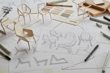 Designer sketching drawing design development product plan draft chair armchair Wingback Interior furniture prototype manufacturing production. designer studio concept .