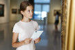 © JackF - Teenage girl visiting museum