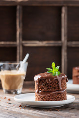 Wall Mural - Chocolate mini cake on the wooden table