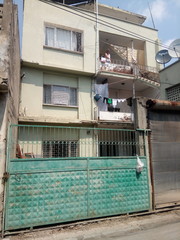 Wall Mural - an old house and poverty in Turkey