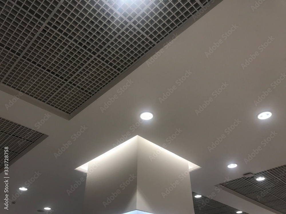 Suspended Grid false ceiling with gypsum bulkhead design and column ...