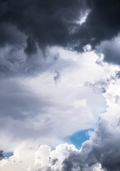 Wall Mural - terrible thunderclouds from the side of a plane. gloomy epic clouds. background image in a dark gray