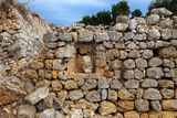Fototapeta Desenie - Salort site, Menorca / Spain - June 23, 2016: Prehistoric site and ruins at Taula de Torralba d'en Salort, Menorca, Balearic Islands, Spain
