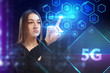 © photon_photo - Business, Technology, Internet and network concept. Young businessman working on a virtual screen of the future and sees the inscription: 5G