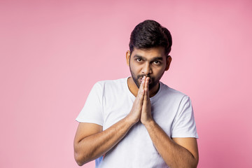 Sticker - Portrait of handsome Indian guy standing on pink background