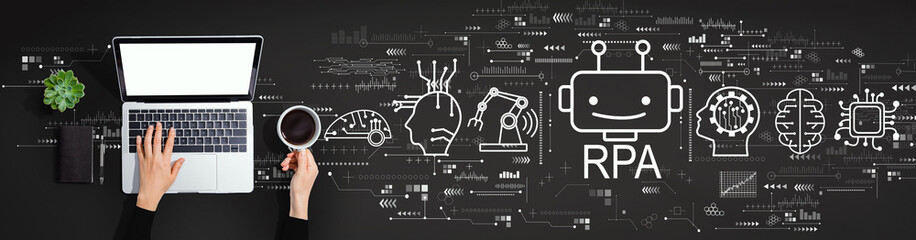 robotic process automation concept with person using a laptop computer
