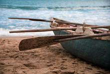 Close Up On The Wooden Oar Of A Fishing Boat On The Beach. Tropical Caribbean Paradise. Dominican Republic Typical Seascape. Selective Focus