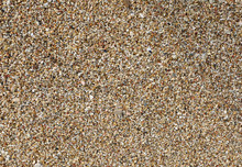 Thousands Of Tiny Pebbles Smoothed By The Waves Of The Sea